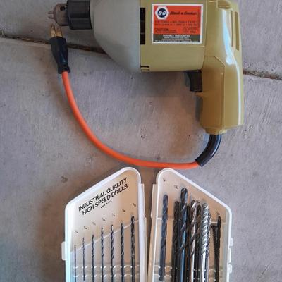 Black and Decker 3/8" electric drill and accessories