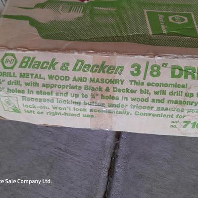 Black and Decker 3/8" electric drill and accessories