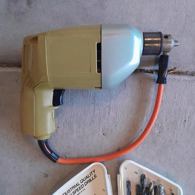 Black and Decker 3/8" electric drill and accessories