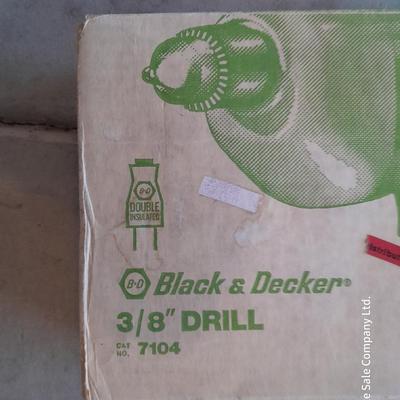 Black and Decker 3/8" electric drill and accessories