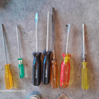 Assortment of hand tools - screwdrivers - hammer - wrenches and more