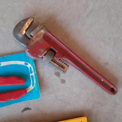 Variety of tools - pipe wrench - drill bits - pliers set in storage bag and more