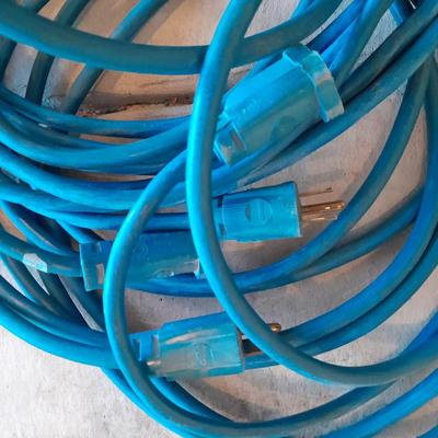 Two blue extension cords and a brand new 5x7 tarp