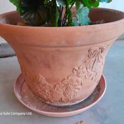 Nice decorative Terra cotta flower pot with faux geraniums