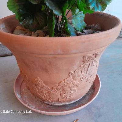 Nice decorative Terra cotta flower pot with faux geraniums