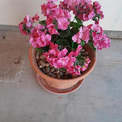 Nice decorative Terra cotta flower pot with faux geraniums