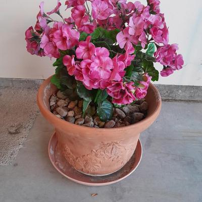 Nice decorative Terra cotta flower pot with faux geraniums