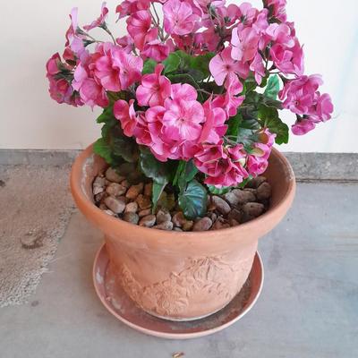 Nice decorative Terra cotta flower pot with faux geraniums