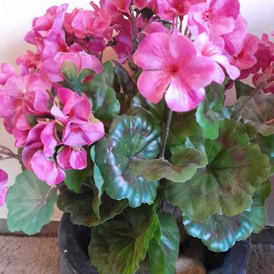 Nice blue ceramic flower pot with faux geraniums
