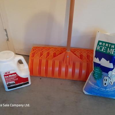 Snow shovel and ice melt