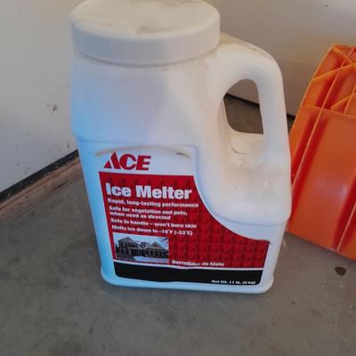 Snow shovel and ice melt