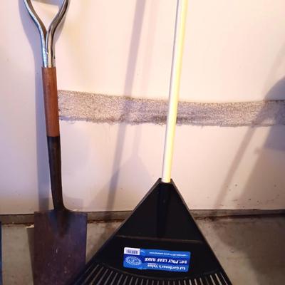 Nice 24" Poly leaf rake and a flat head shovel with a handle