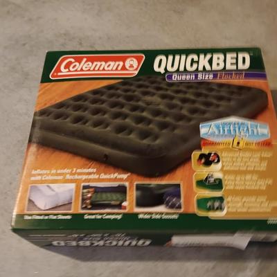 Coleman Quickbed queen sized flocked air mattress.