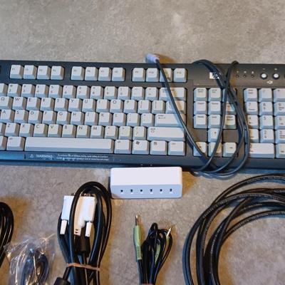 HP Keyboard and Mouse with a variety of cords and cables