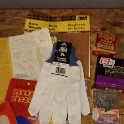 Home hardware - screws - nails - sandpaper - bags of hardware - gloves