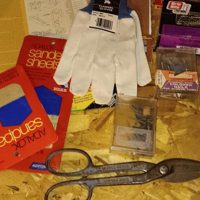 Home hardware - screws - nails - sandpaper - bags of hardware - gloves