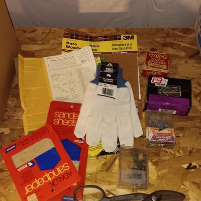 Home hardware - screws - nails - sandpaper - bags of hardware - gloves