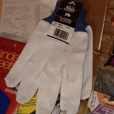Home hardware - screws - nails - sandpaper - bags of hardware - gloves