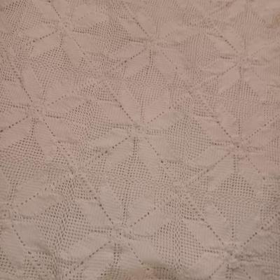 Hand knitted bedspread
