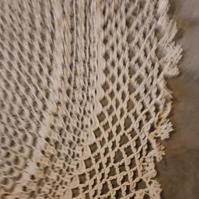 Round hand knitted tablecloth