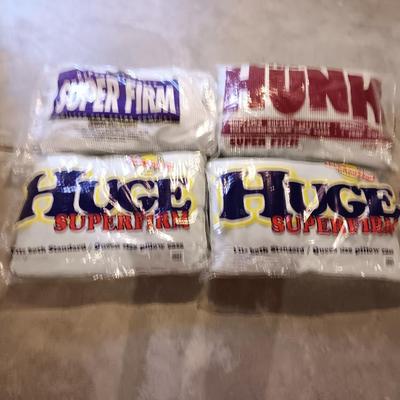 Four pillows that appear new