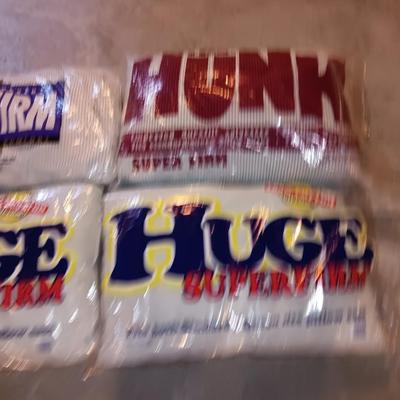 Four pillows that appear new