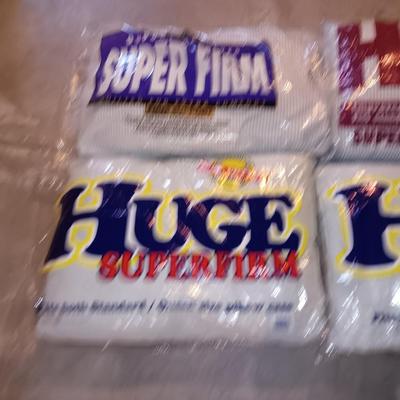Four pillows that appear new