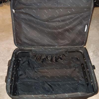 Nice nesting 3-piece PROTOCOL suitcase set with pull along handles - 3 different sizes.
