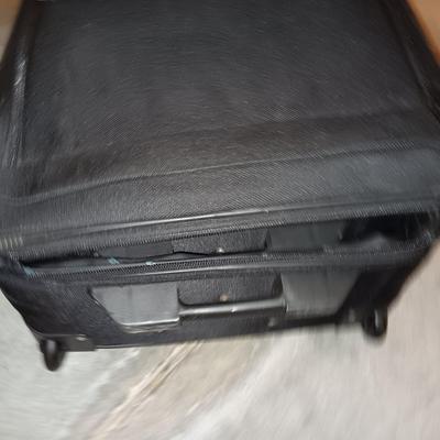 Nice nesting 3-piece PROTOCOL suitcase set with pull along handles - 3 different sizes.