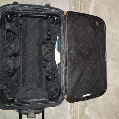 Nice nesting 3-piece PROTOCOL suitcase set with pull along handles - 3 different sizes.
