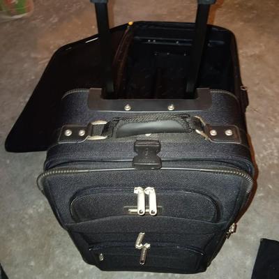 Nice nesting 3-piece PROTOCOL suitcase set with pull along handles - 3 different sizes.
