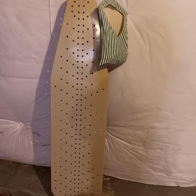Metal folding ironing board with black& decker clothes iron and clothes pin bag