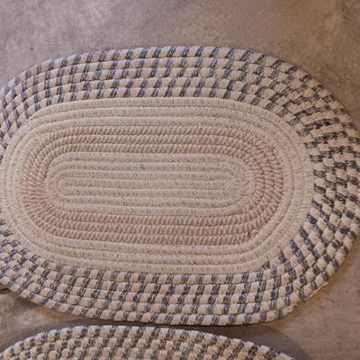 Two multicolored woven throw rugs