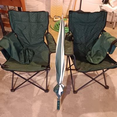 Two portable folding camping chairs with a matching umbrella