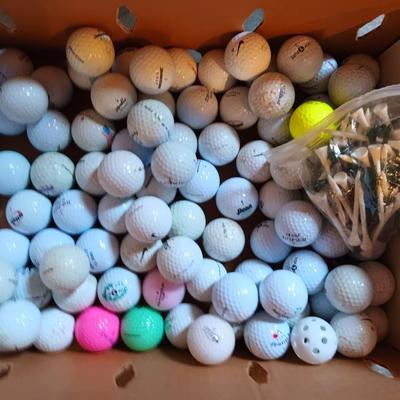 Box with an assortment of golf balls