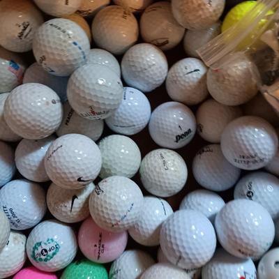 Box with an assortment of golf balls