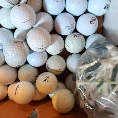 Box with an assortment of golf balls