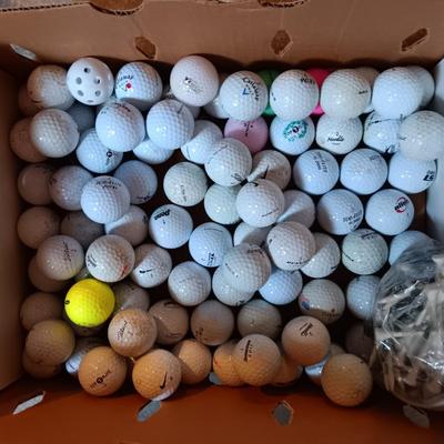 Box with an assortment of golf balls