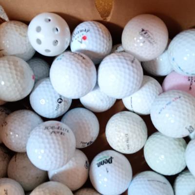 Box with an assortment of golf balls