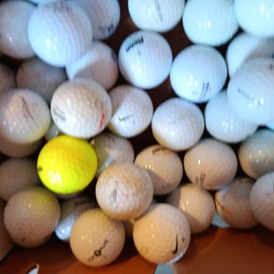 Box with an assortment of golf balls