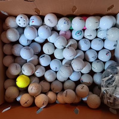 Box with an assortment of golf balls