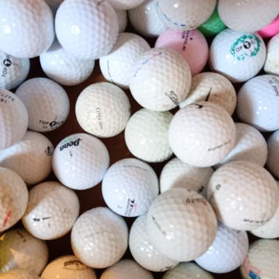 Box with an assortment of golf balls