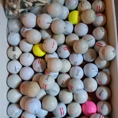 Box with a variety of golf balls