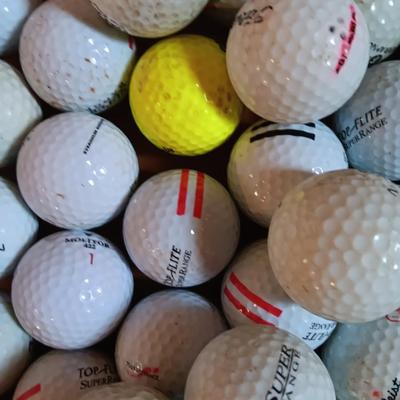 Box with a variety of golf balls