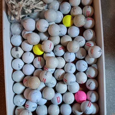 Box with a variety of golf balls