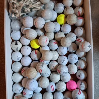 Box with a variety of golf balls