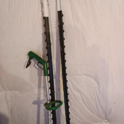 Plastic flowerpots - two T posts and an electric weed eater