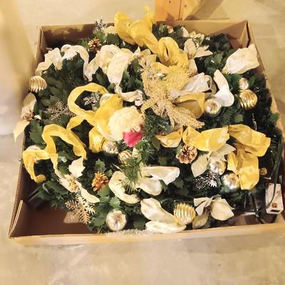 Neat collapsing Instant Christmas tree - decorated and light up with wrapping paper in storage tote