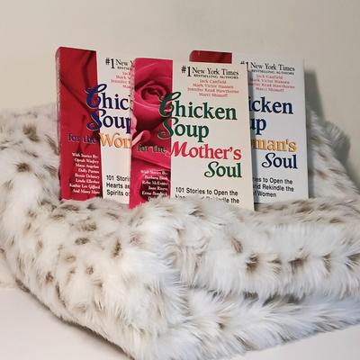 LOT 14U: Jennifer Lopez Snow Leopard Print Throw w/ Chicken Soup for the Soul Books