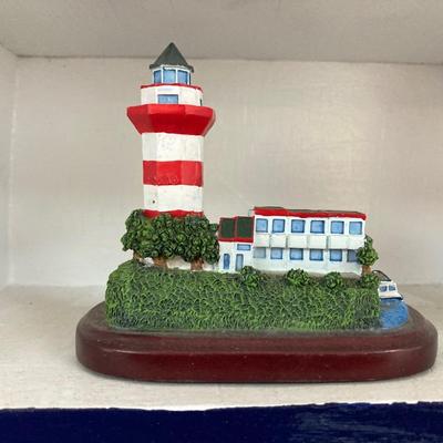 LOT 68S: Blue and White Wooden Boat Shelf with Collection of Glass Lighthouses, Candles and More